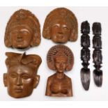Four Balinese carved masks & busts twinned with tw
