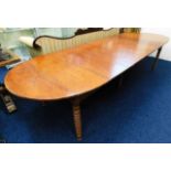 A 19thC. American walnut extending table 122in lon