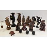 A quantity of mixed Chinese hardwood carvings