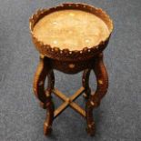 A c.1900 carved Anglo-Indian table with mother of