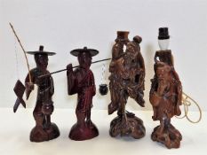 Four carved hardwood Chinese figures including two