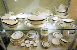 A Royal Doulton dinner service including tea & cof