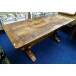 A rustic 19thC. oak farmhouse table with cleated e
