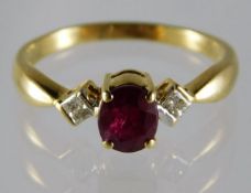 An 18ct gold ring set with ruby & diamond 2.9g siz