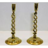 A pair of 19thC. barley twist brass candlesticks 1