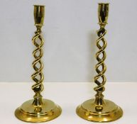 A pair of 19thC. barley twist brass candlesticks 1