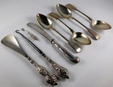 Four silver teaspoons, a small silver button hook,