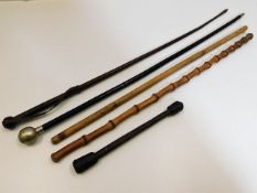 Four swagger sticks & one weight cosh