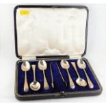 A cased silver teaspoon & tongs set by James Dixon