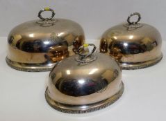 Three graduated silver plated 19thC. cloche by Elk