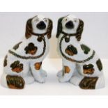 A pair of Victorian Staffordshire pottery mantelpi