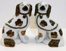 A pair of Victorian Staffordshire pottery mantelpi