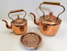 Two early Georgian copper kettles twinned with a 1