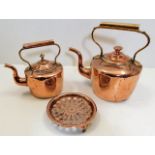 Two early Georgian copper kettles twinned with a 1