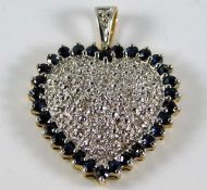 A 9ct gold pendant set with diamond & sapphire 3g