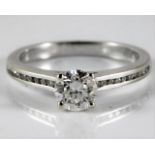 An 18ct white gold ring set with approx. 0.55ct ce