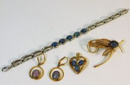 A small selection of silver jewellery mounted with