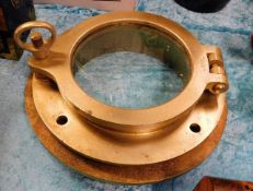 A ship's glazed porthole with mounting plate 13in