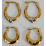 Two pairs of 9ct gold earrings 1.5g