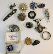 A quantity of mixed silver & white metal brooches