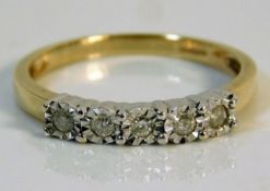 A 9ct gold ring set with illusion set diamonds siz