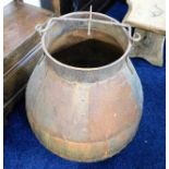 A riveted steel cauldron with handle 27in high