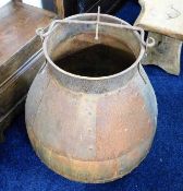 A riveted steel cauldron with handle 27in high