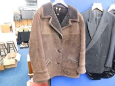A size 18 Baily's of Glastonbury sheepskin coat