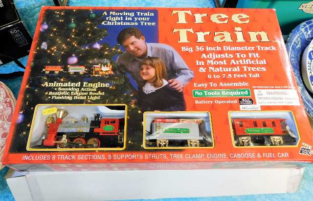 A boxed Christmas tree train