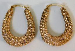 A pair of white stone encrusted hoop earrings 4.8g