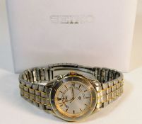 A gents Seiko kinetic watch with box