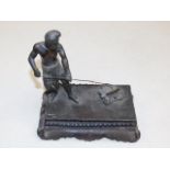 A c.1900 bronze figure of working man on plinth, p