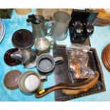 A crumb brush & pan twinned with pewter tankards,