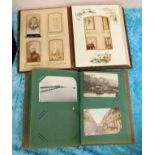 A Victorian family photo album twinned with a smal