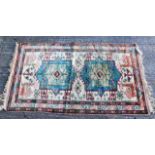 An early 20thC. Turkish style rug 77in x 41in