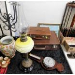 A Victorian opaline oil lamp faults to brass stand