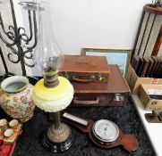 A Victorian opaline oil lamp faults to brass stand