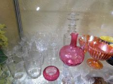 A Victorian cranberry glass decanter, a cranberry