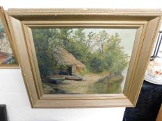 A c.1900 gilt framed oil painting depicting boatho