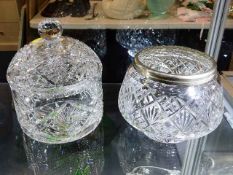 A cut glass jar & cover twinned with a cut glass r