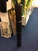 A decorative "didgeridoo" style wooden object 48in