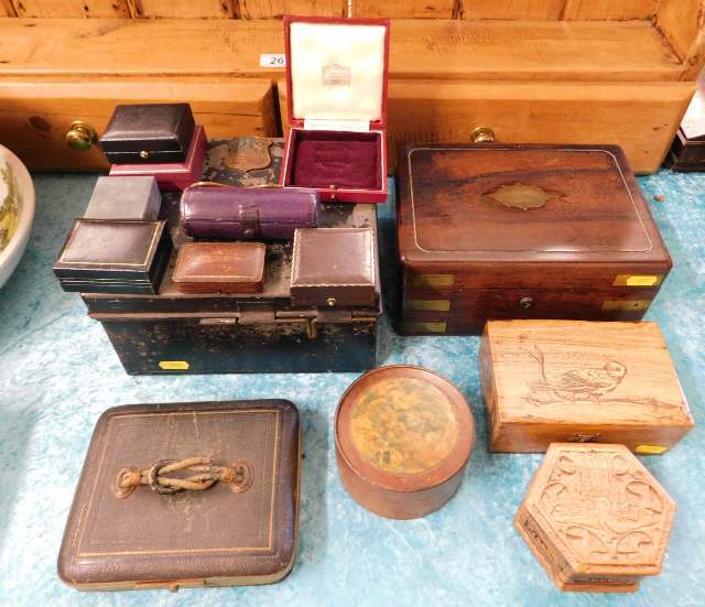 A Victorian rosewood box twinned with other boxes