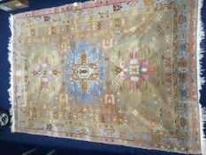 A woollen rug 78in x 54in