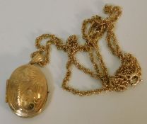A 9ct gold locket with chain