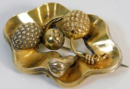 An antique yellow metal brooch of organic form 10.