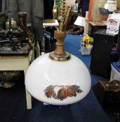 A 1970's pull down retro lamp fitting twinned with a novelty table lamp