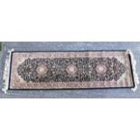 A man made silk Persian style runner 87in x 25in