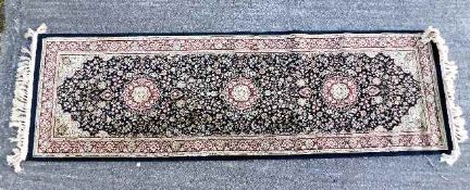 A man made silk Persian style runner 87in x 25in