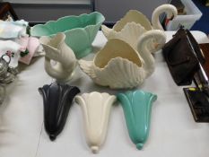 Two Dartmouth pottery swans twinned with three Dar