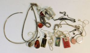 A quantity of silver & white metal necklaces